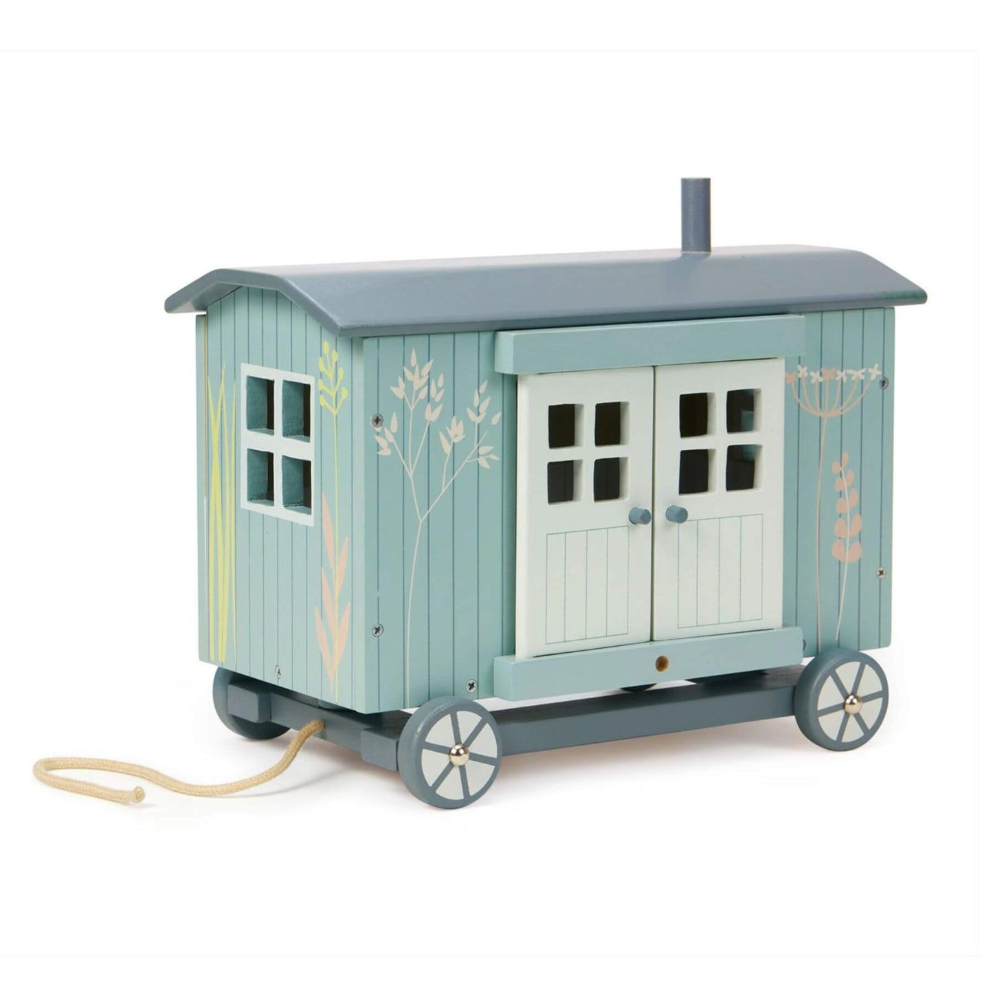 Toy shepherd's hut with wheels on a white background