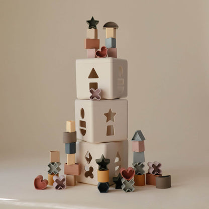 Stack of Mushie Shape Sorting Box