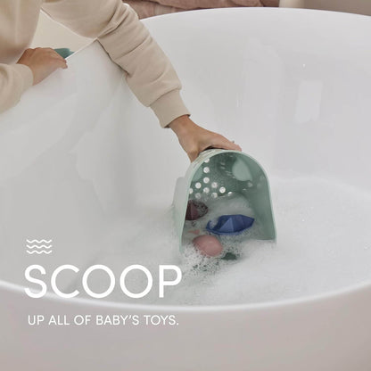 Person scooping water with a green toy from a bathtub, with text 'SCOOP UP ALL OF BABY'S TOYS.'