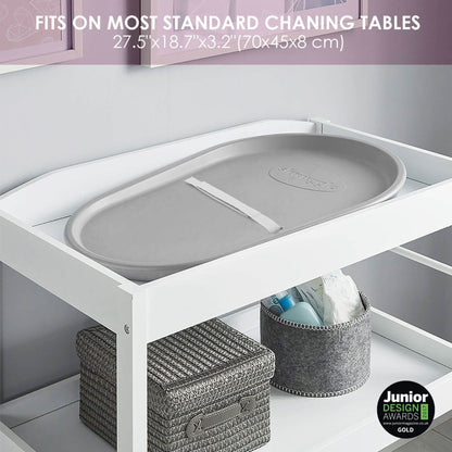 Gray tray on a white table with dimensions and design award text