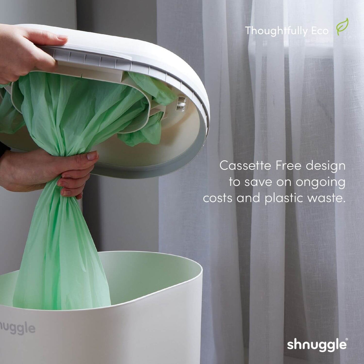 Person using a shnuggle product with a green bag, against a neutral background.