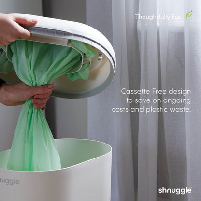 Person using a shnuggle product with a green bag, against a neutral background.