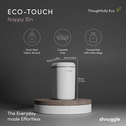 Shnuggle Eco-Touch Nappy Bin Diaper Pail - White with a wooden base, displayed on a dark gray background with product feature icons and dimensions.