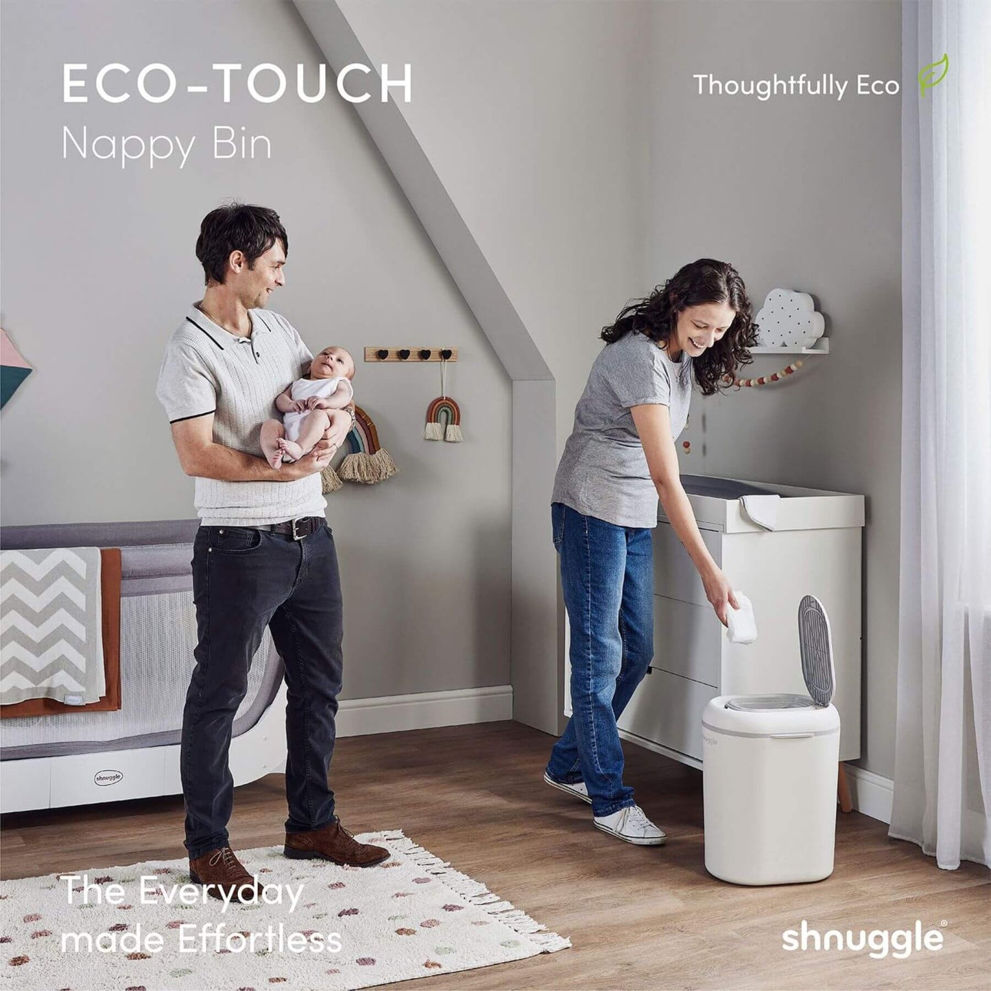Family in a nursery with Shnuggle Eco-Touch Nappy Bin Diaper Pail - White