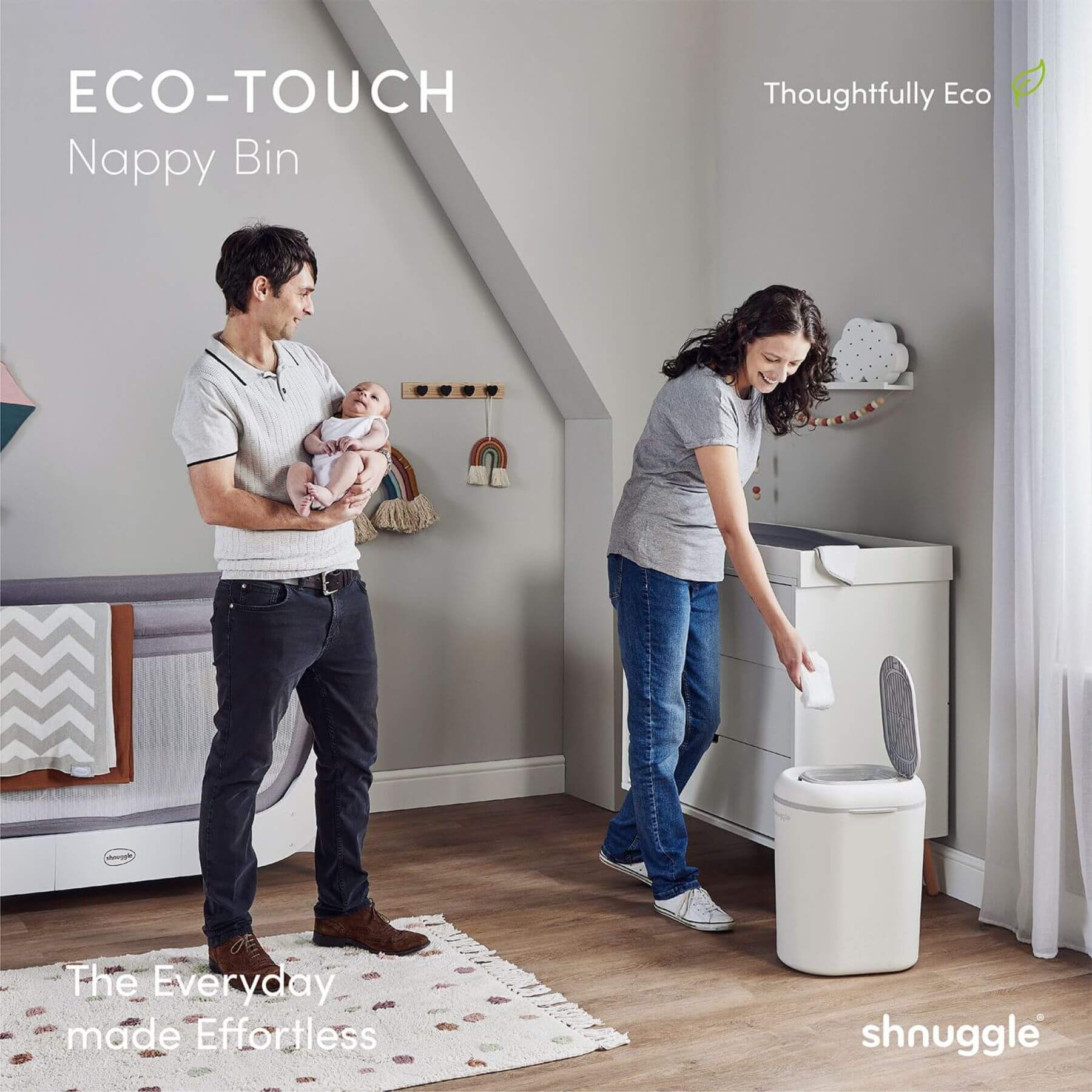 Family in a nursery with Shnuggle Eco-Touch Nappy Bin Diaper Pail - White