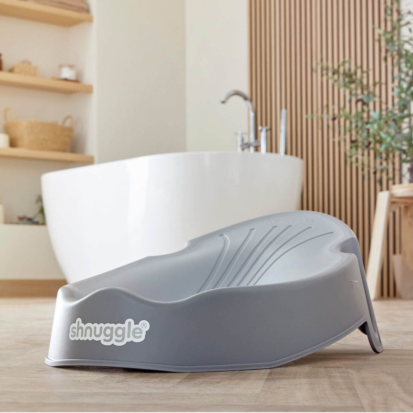 Shnuggle Newborn Baby Bath Support in bathroom