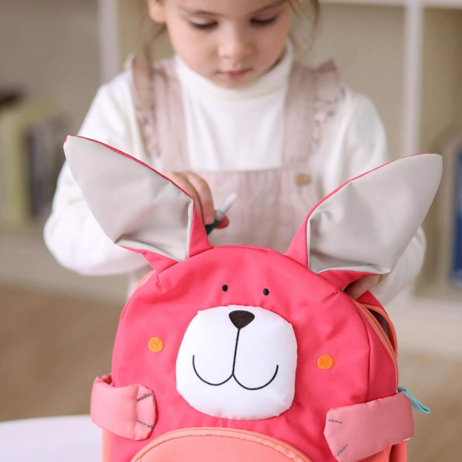 Child holding sigikid Bunny Backpack