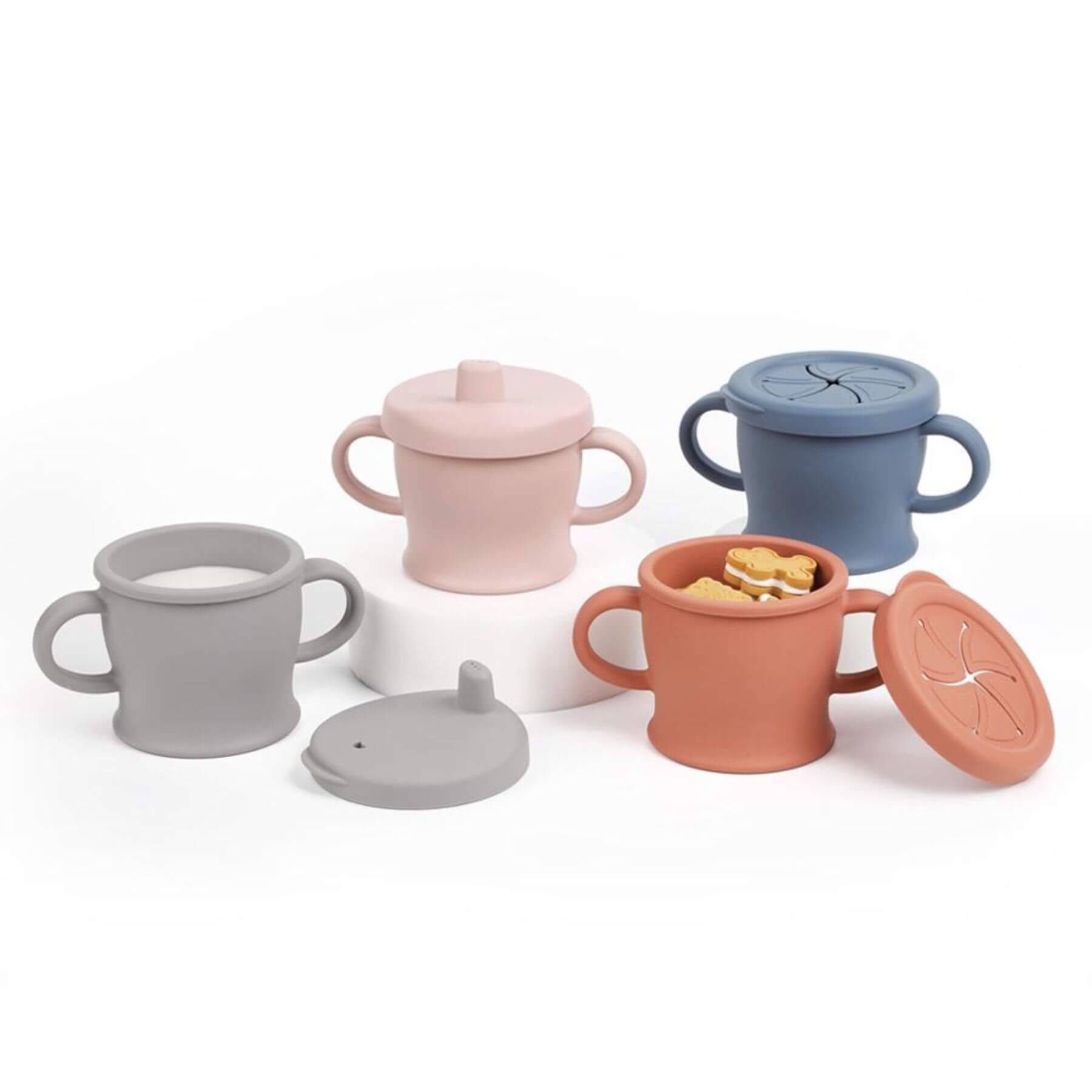 Set of colorful silicone cups with lids