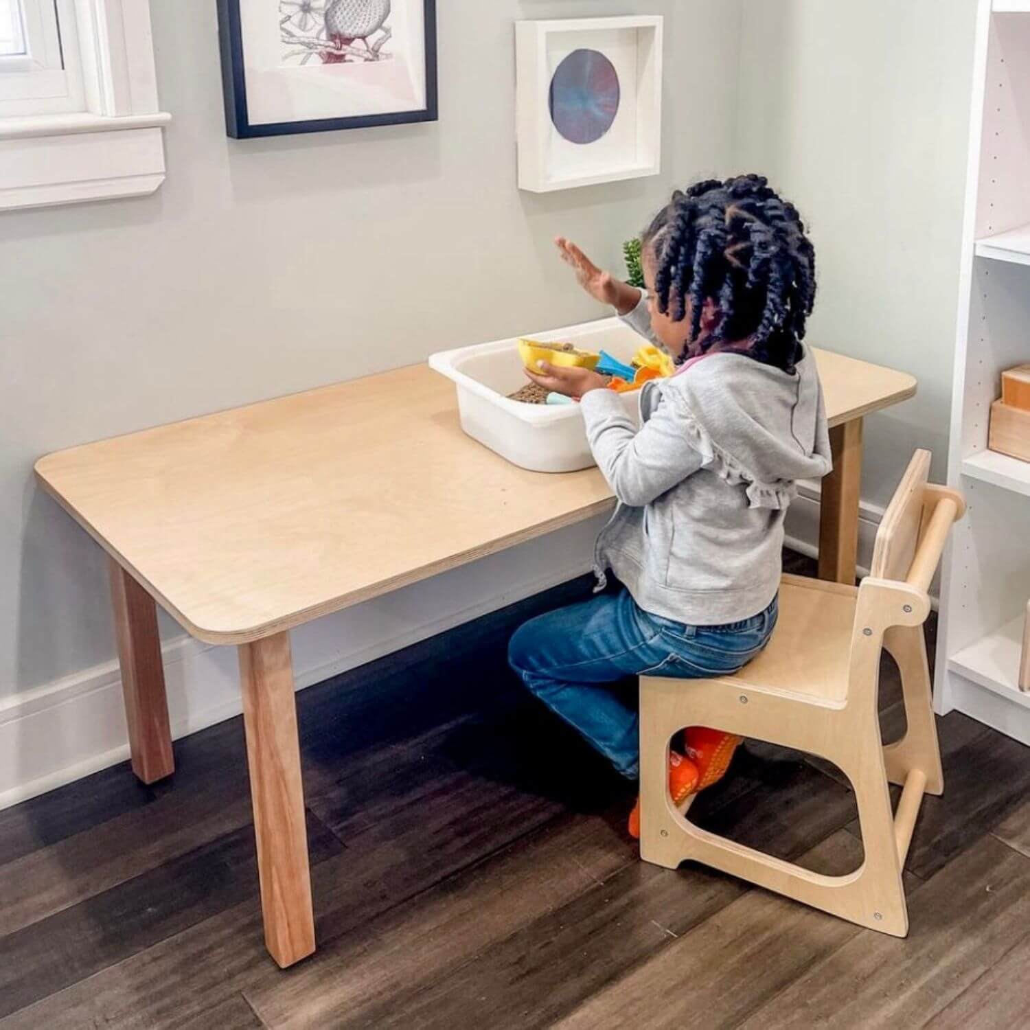 Kid Sitting on RAD Children's Furniture Skoolhaus Chair, Playing at Table