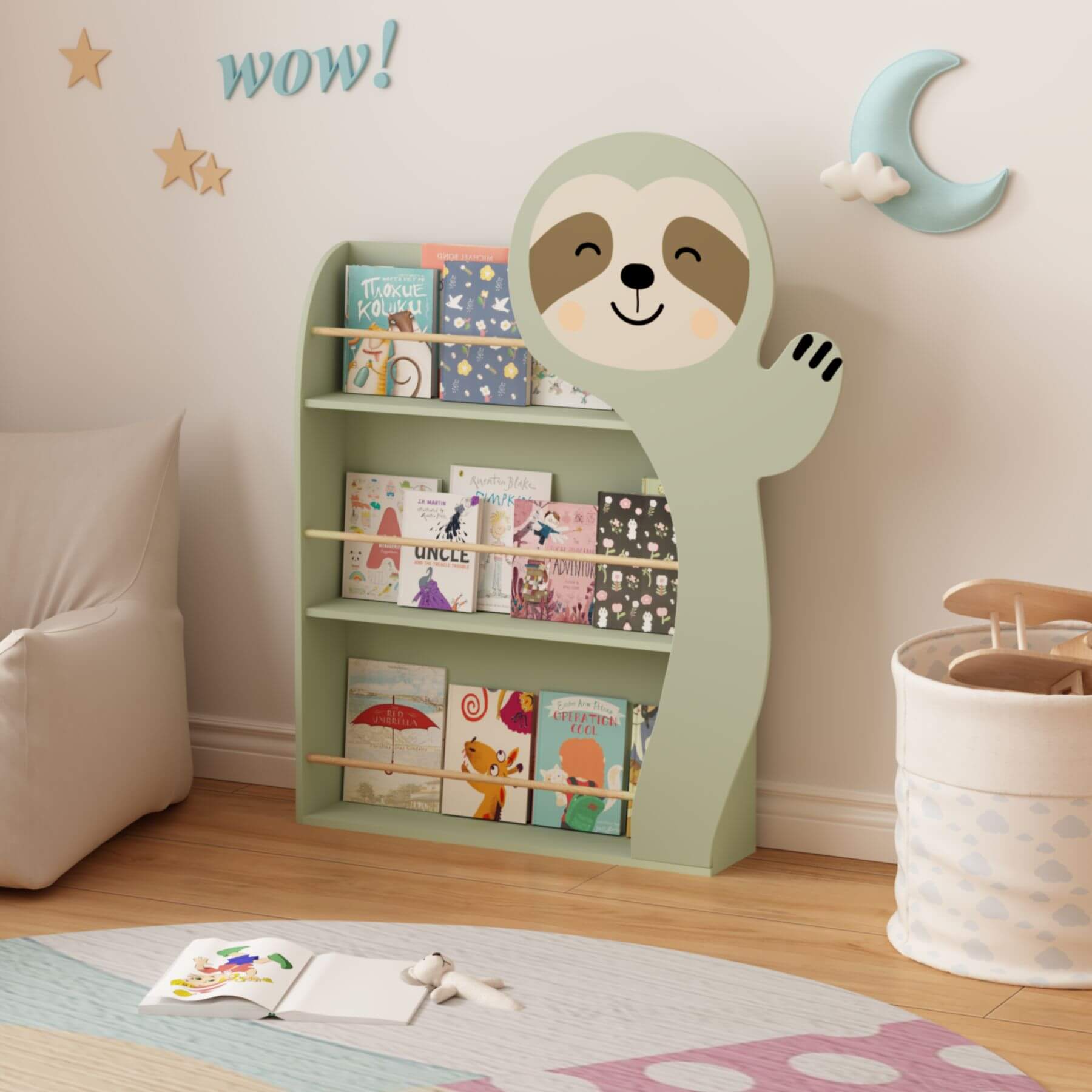 MOONRIVER Sloth Kids 3-Tier Front-Facing Bookshelf - Sage Green in a room with books and toys.