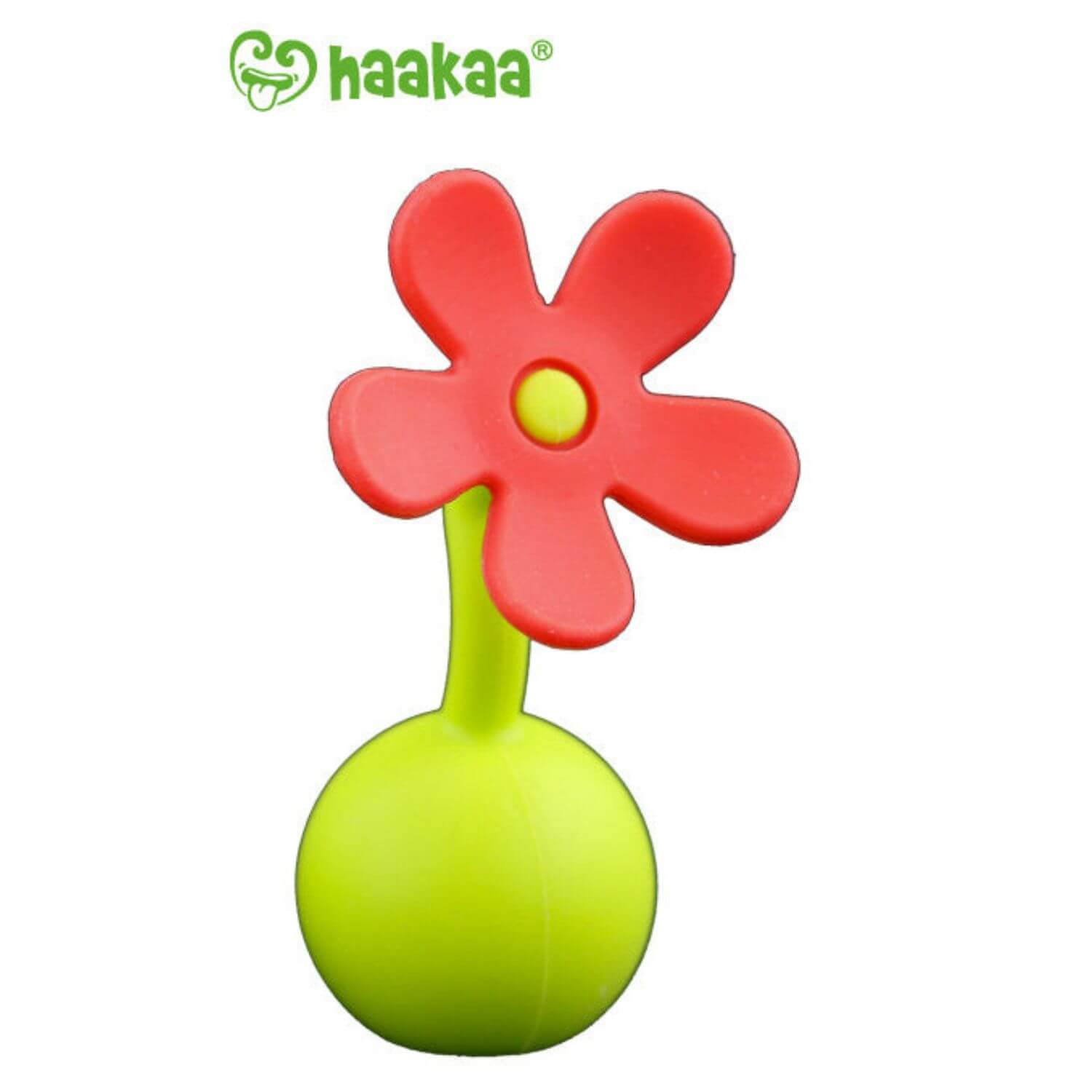 Orange flower stopper with 'haakaa' branding on a white background