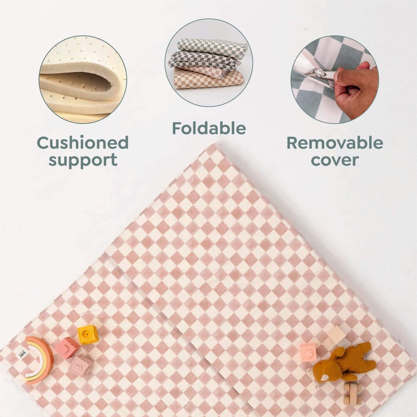Pink checkered mat with cushioned support, foldable design, and removable cover features on a white background.