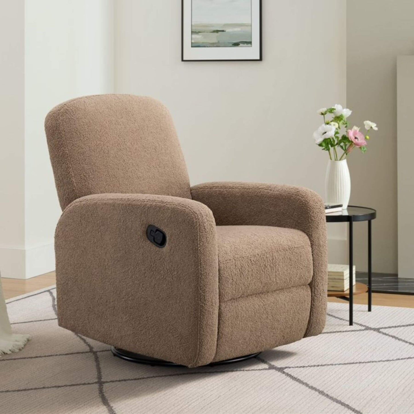 Oxford Baby Snuggly Glider - Teddy Brown in a living room setting with a side table and flowers.