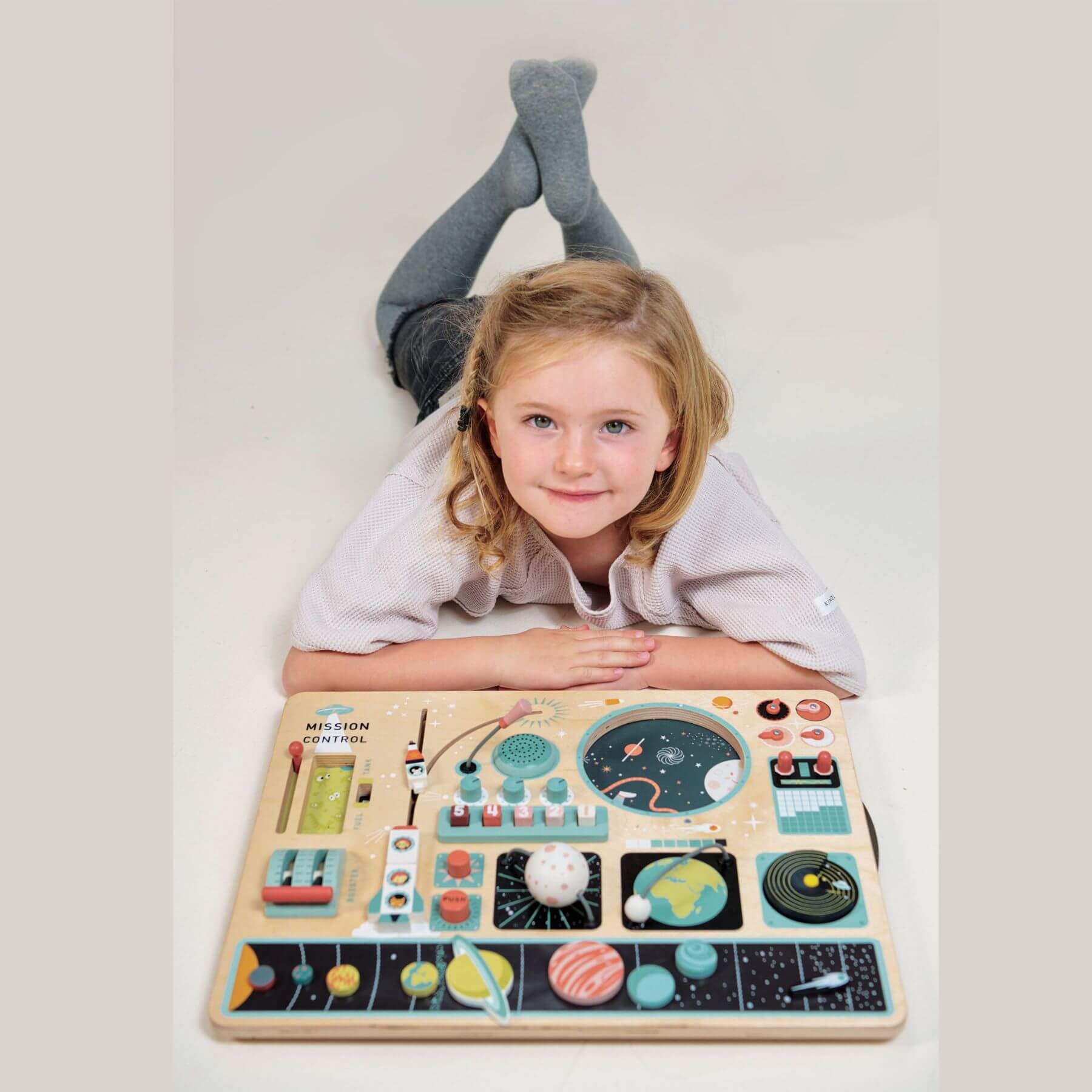 Child playing with Tender Leaf Space Station