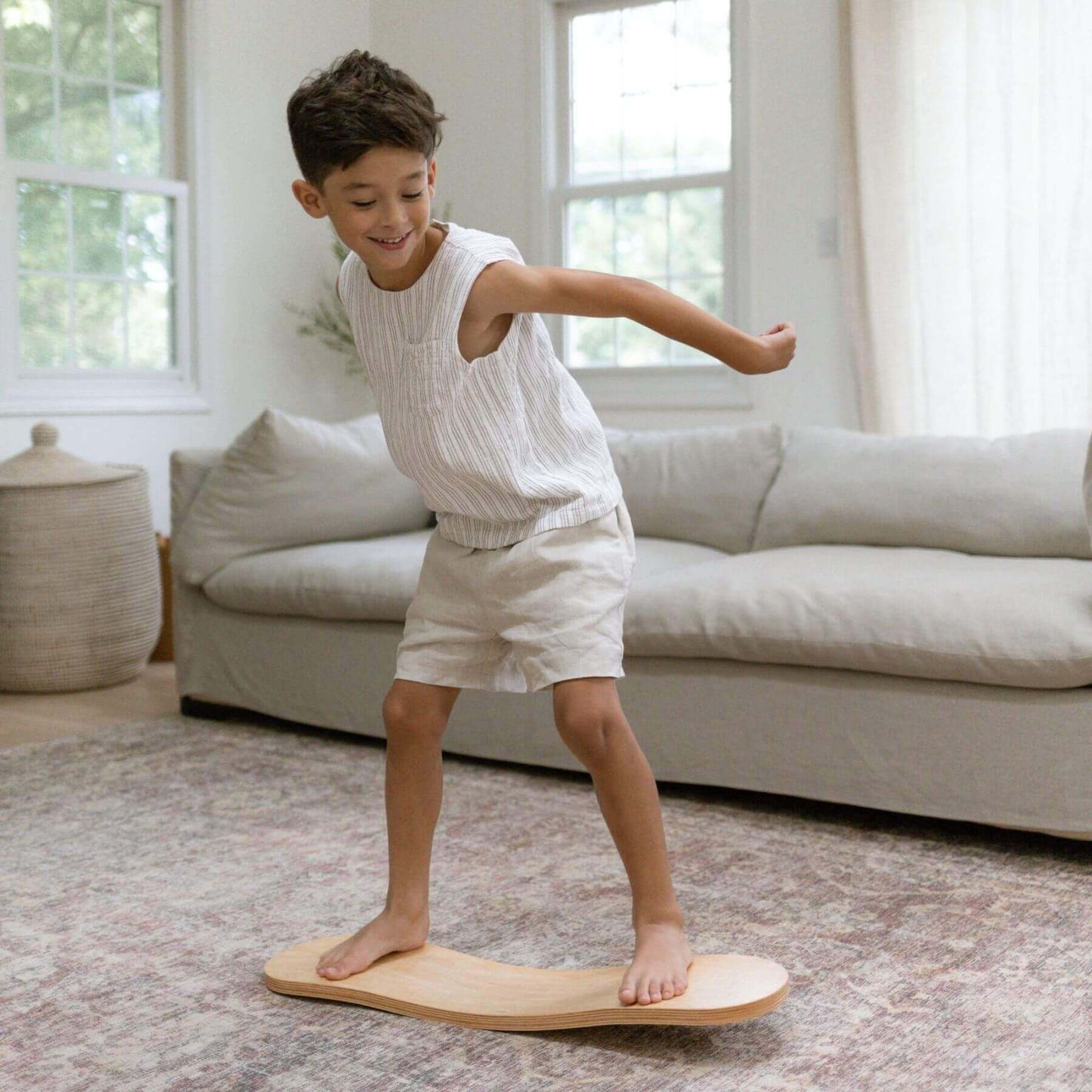 Kid playing with Spinzee Board in a living room