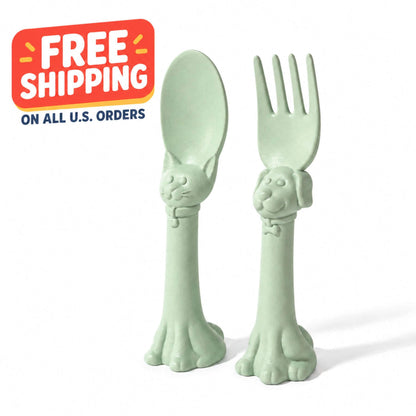 Spoon la la Toddler Utensils — 2-Pack - Green, shown on a white background with a red and yellow 'FREE SHIPPING' promotional badge in the top-left corner.