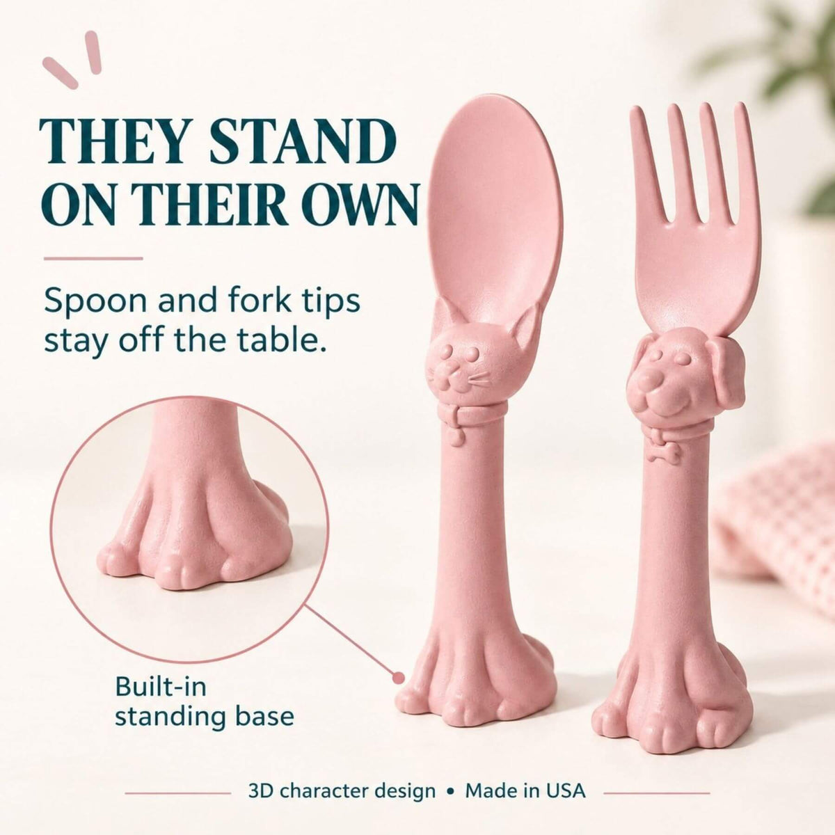 Spoon la la Toddler Utensils — 2-Pack - Pink, shown on a light beige background with promotional text explaining that the utensils stand on their own.