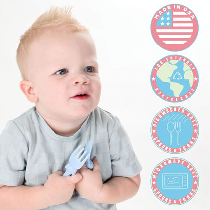 A baby holds a light blue silicone teething toy shaped like a fork. On the right side, there are four circular badges with text: 'MADE IN USA', 'ECO-FRIENDLY', 'DISHWASHER SAFE', and 'MICROWAVE SAFE'.