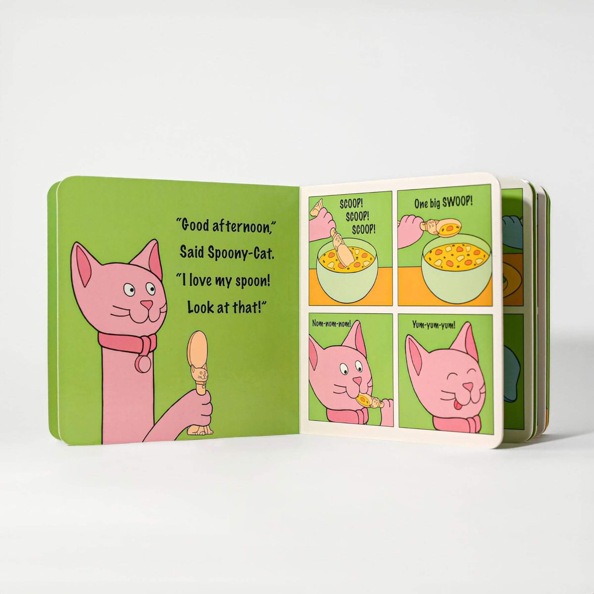 Children's book with cartoon cat illustrations on a white background