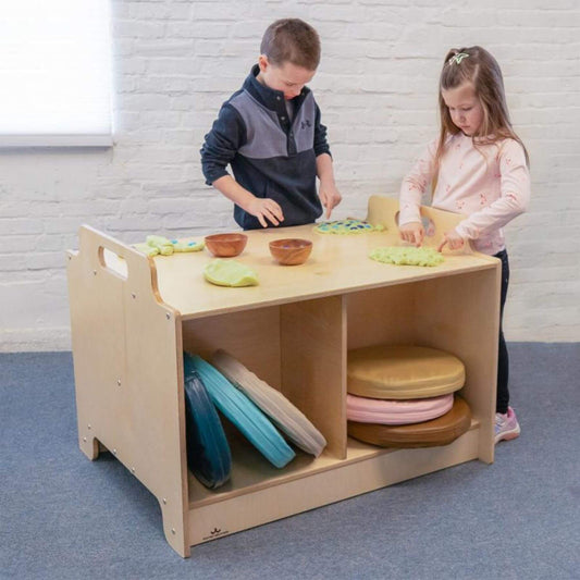 Two children playing with Stack-Able™ Table in a classroom setting.