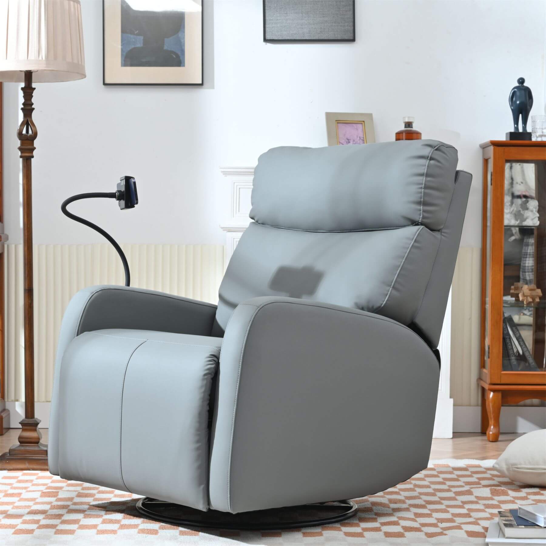 Gray recliner chair in a living room setting with decor elements.