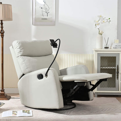 White recliner chair in a living room setting with a lamp and cabinet in the background.