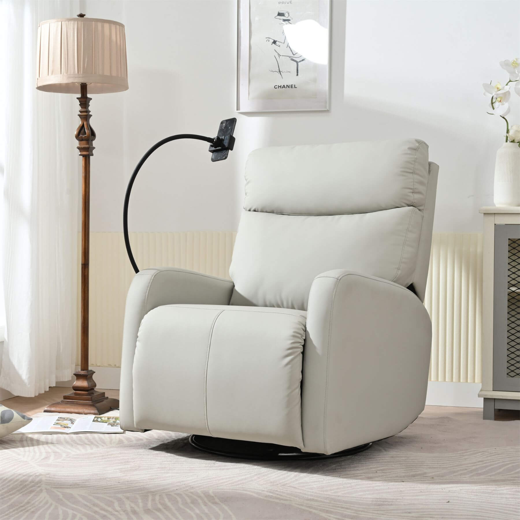 Sunco Swivel Rocker Recliner Chair - Light Gray in a room with a lamp and decor items.
