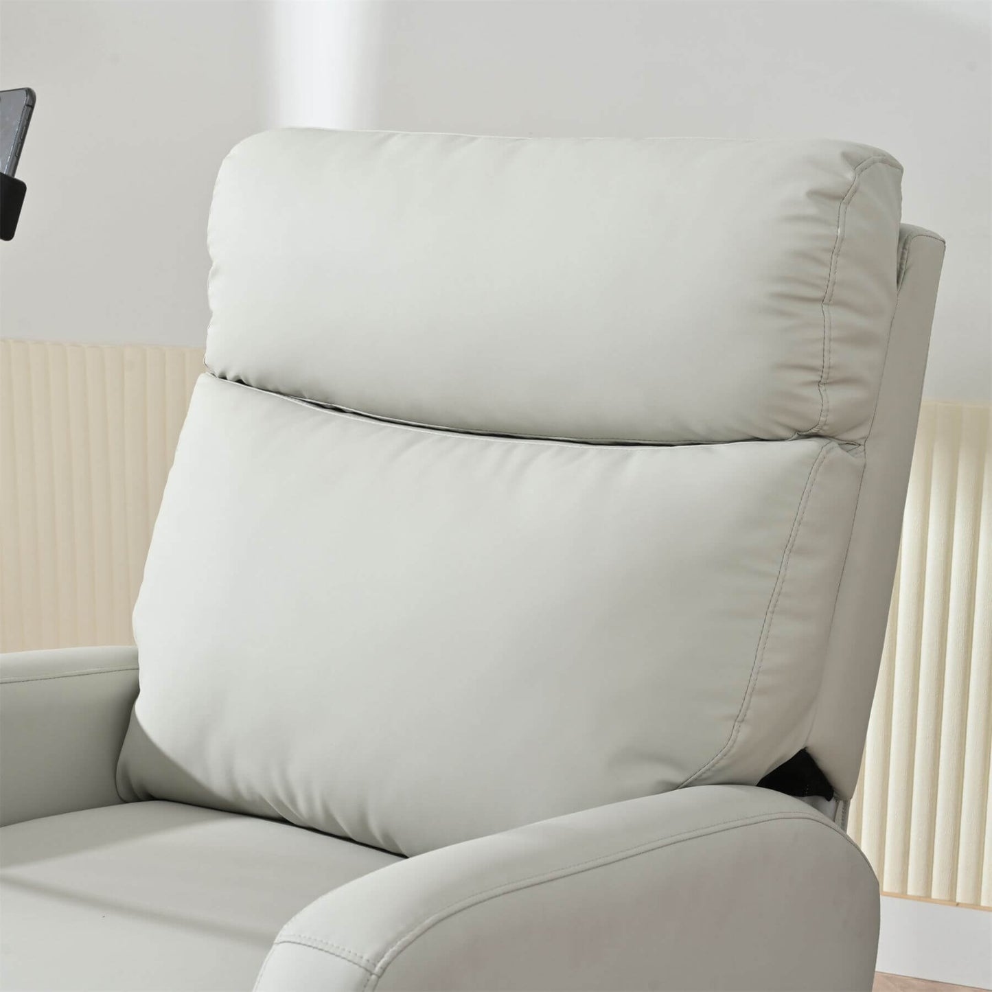 Close-up of Sunco Swivel Rocker Recliner Chair - Light Grayner chair with a neutral background