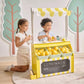 Two children playing with Teamson Sunny Citrus Lemonade Stand Playset
