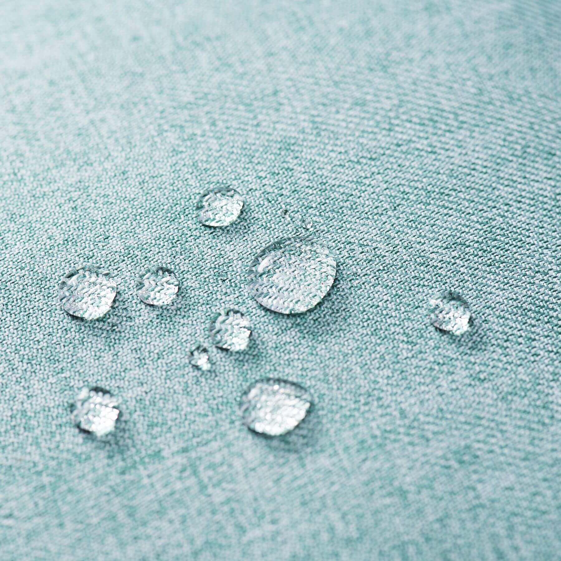 Water droplets on a textured fabric surface