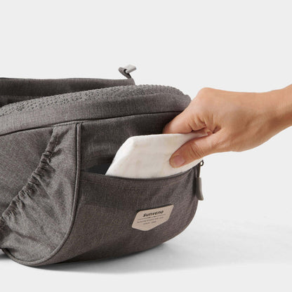 Person taking a white napkin from Sunveno Two Shoulder Straps Baby Hipseat