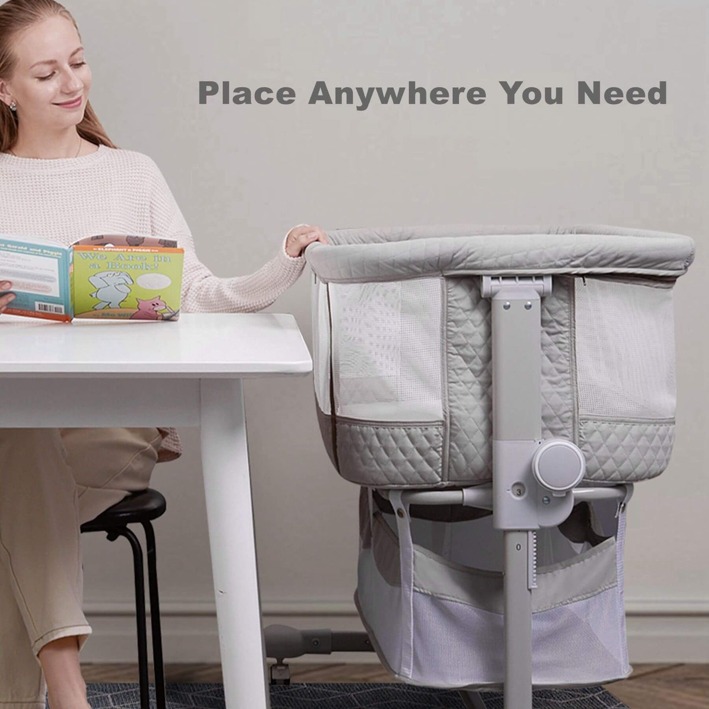 Woman with Sunveno Baby Bassinet Bedside Crib next to a table, with text 'Place Anywhere You Need'.