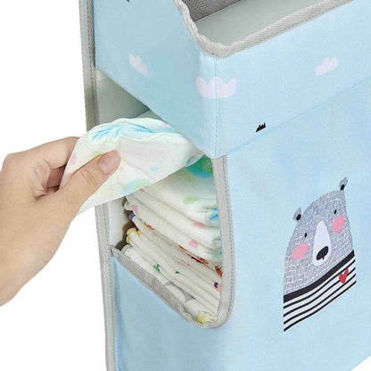 Sunveno 3-in-1 Crib Organizer with cartoon bear design holding baby diapers.