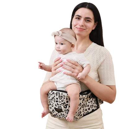 Woman holding a baby in Sunveno Easy Hold Baby Hipseat Carrier