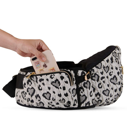 Sunveno Easy Hold Baby Hipseat Carrier with a hand reaching in to place a phone inside on a white background