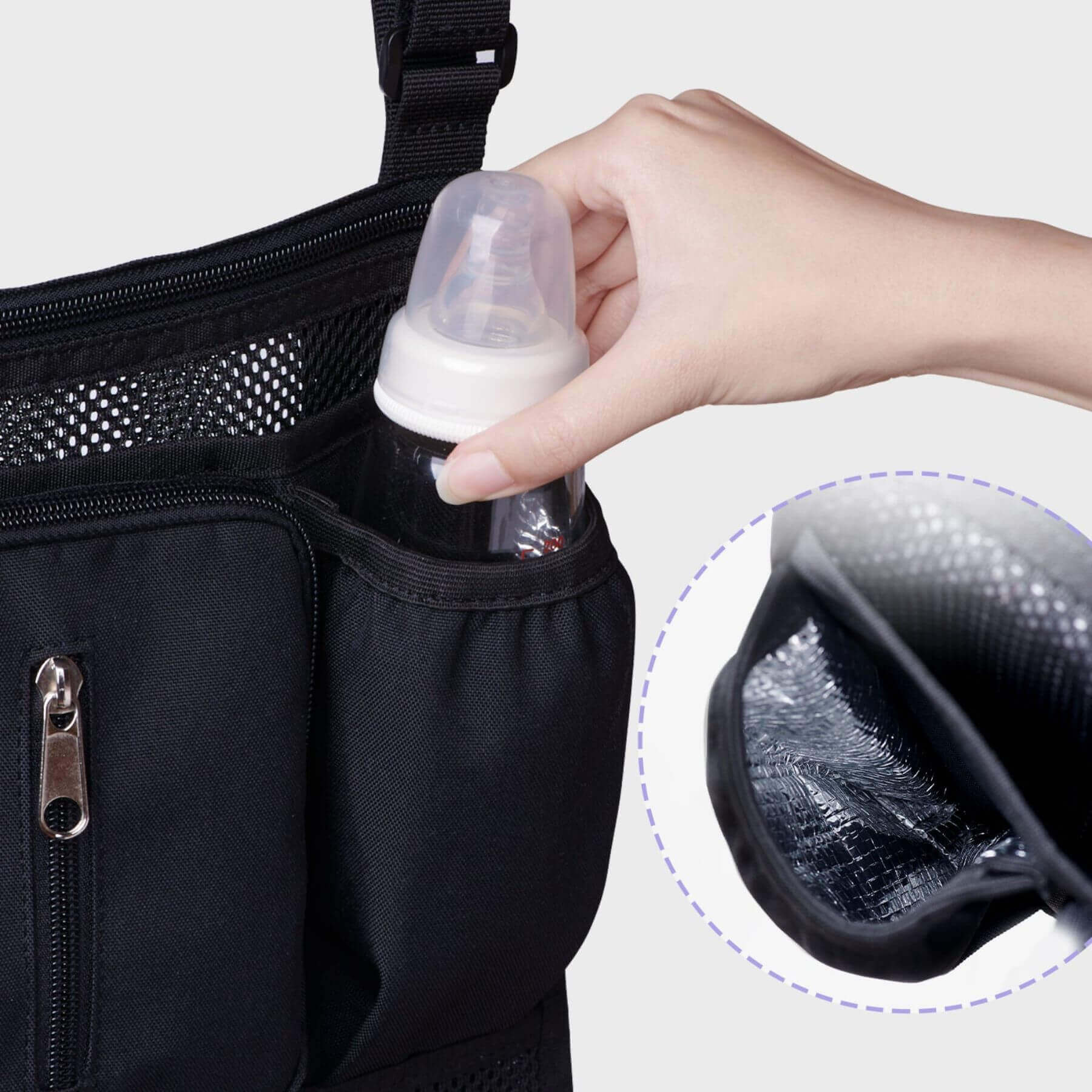 Hand putting a milk bottle into Sunveno Mesh Stroller Organizer
