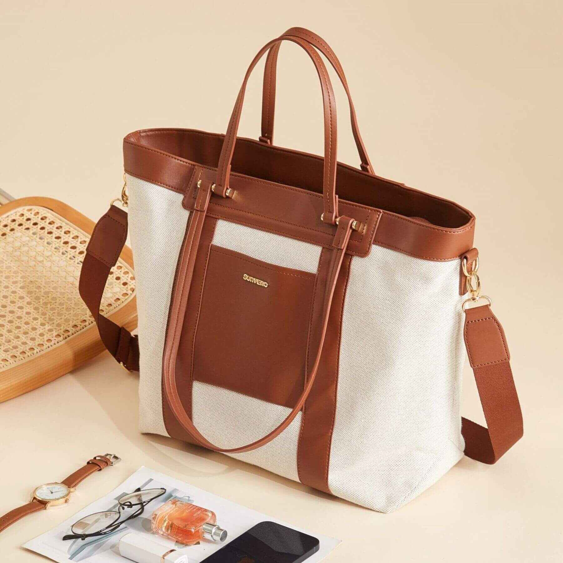 Sunveno The Mommy Tote Bag - Brown on a light background with accessories.