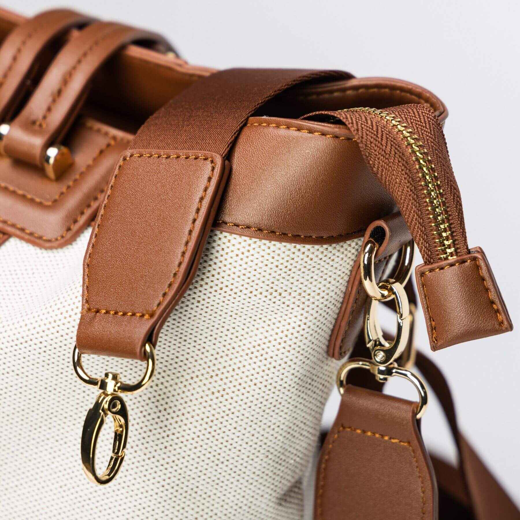 Close-up of Sunveno The Mommy Tote Bag - Brown on a light gray background