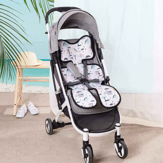 Baby stroller with Sunveno Breathable Stroller Pad in a room with a beach view