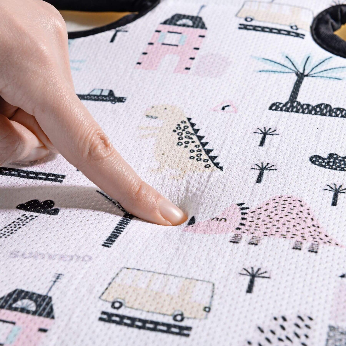 Hand pointing at Sunveno Breathable Stroller Pad