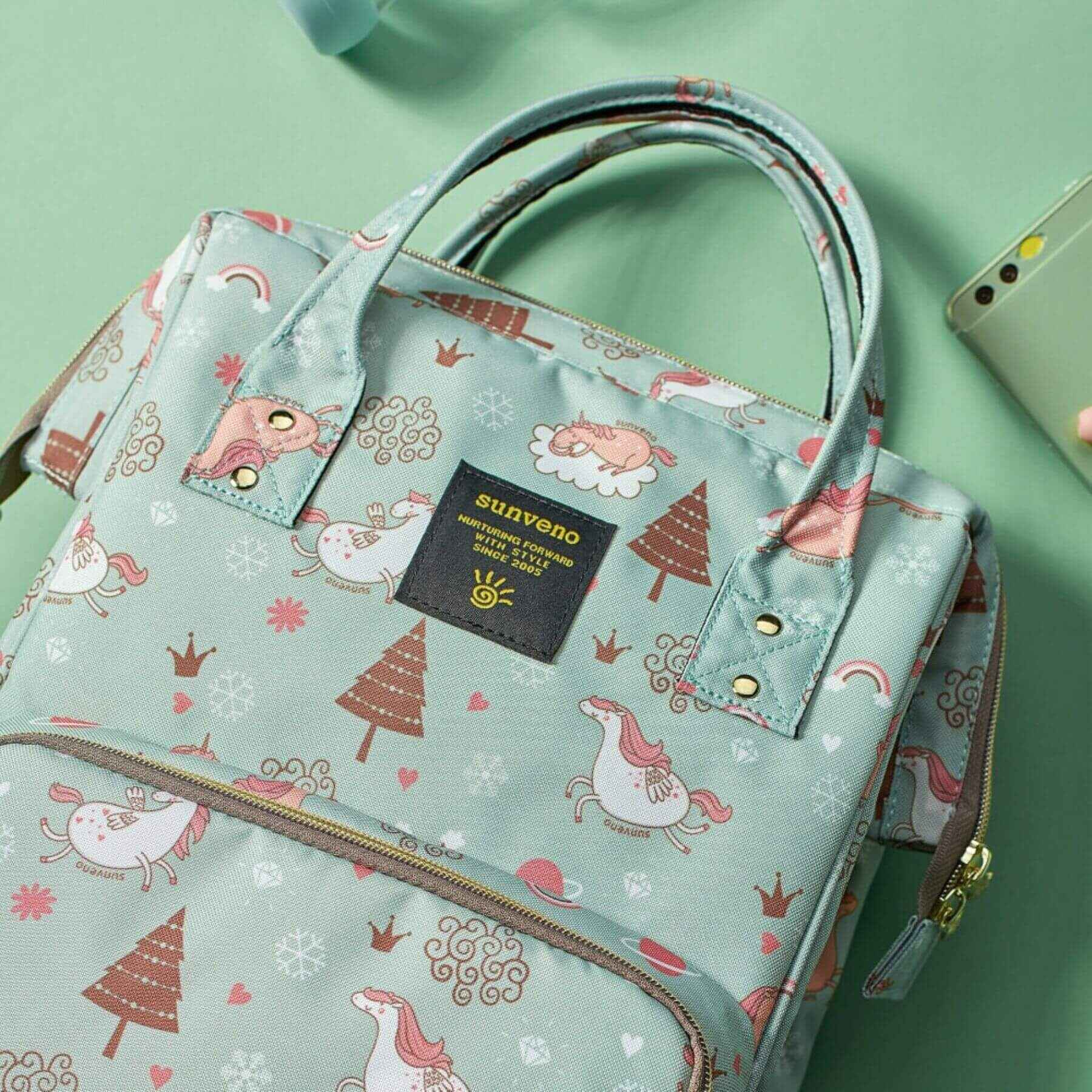 Close-up of Sunveno Timeless Baby Diaper Backpack - Green Unicorn