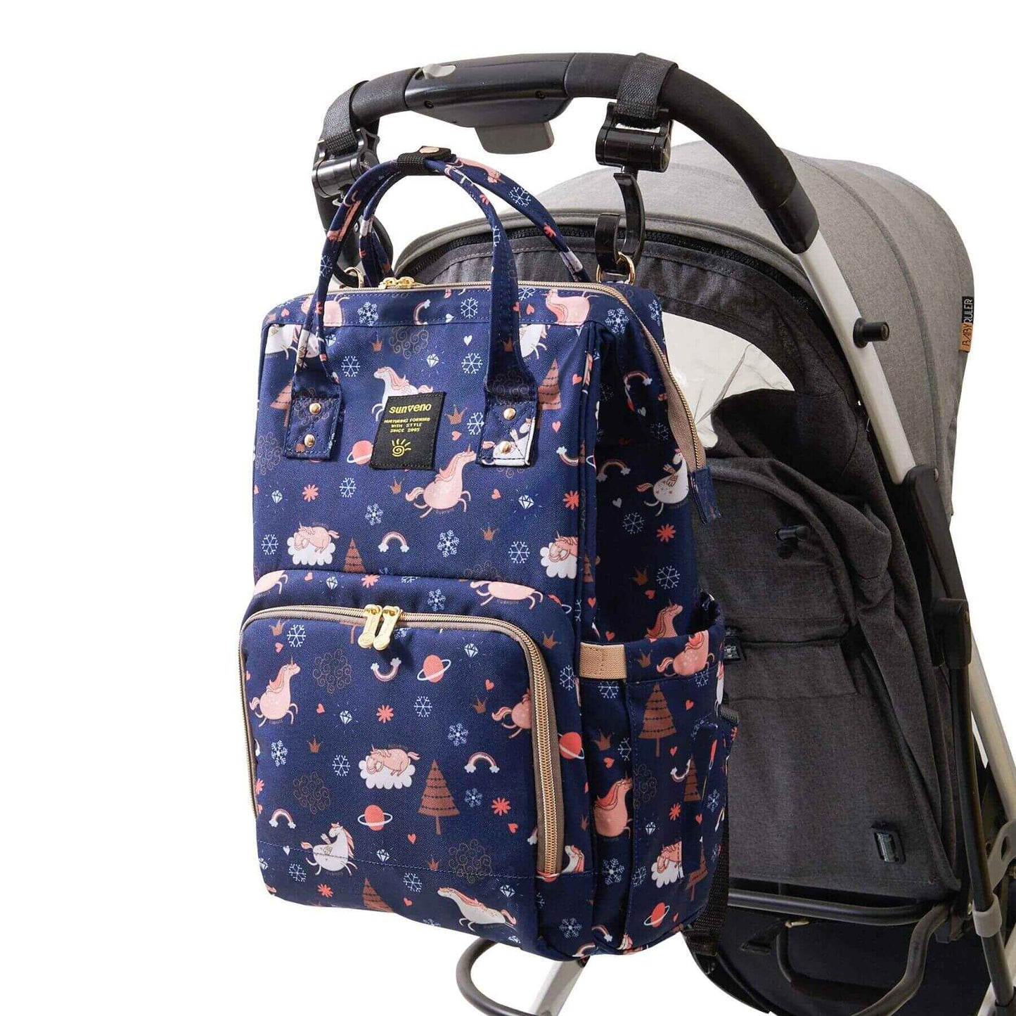 Sunveno Timeless Baby Diaper Backpack - Navy Unicorn attached to a stroller