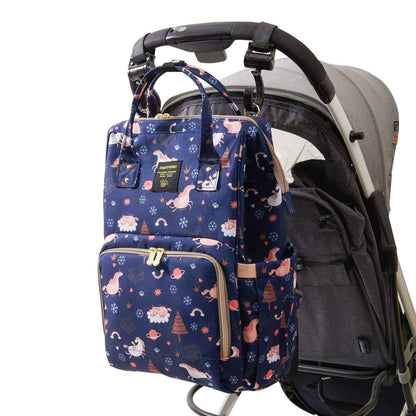 Sunveno Timeless Baby Diaper Backpack - Navy Unicorn attached to a stroller