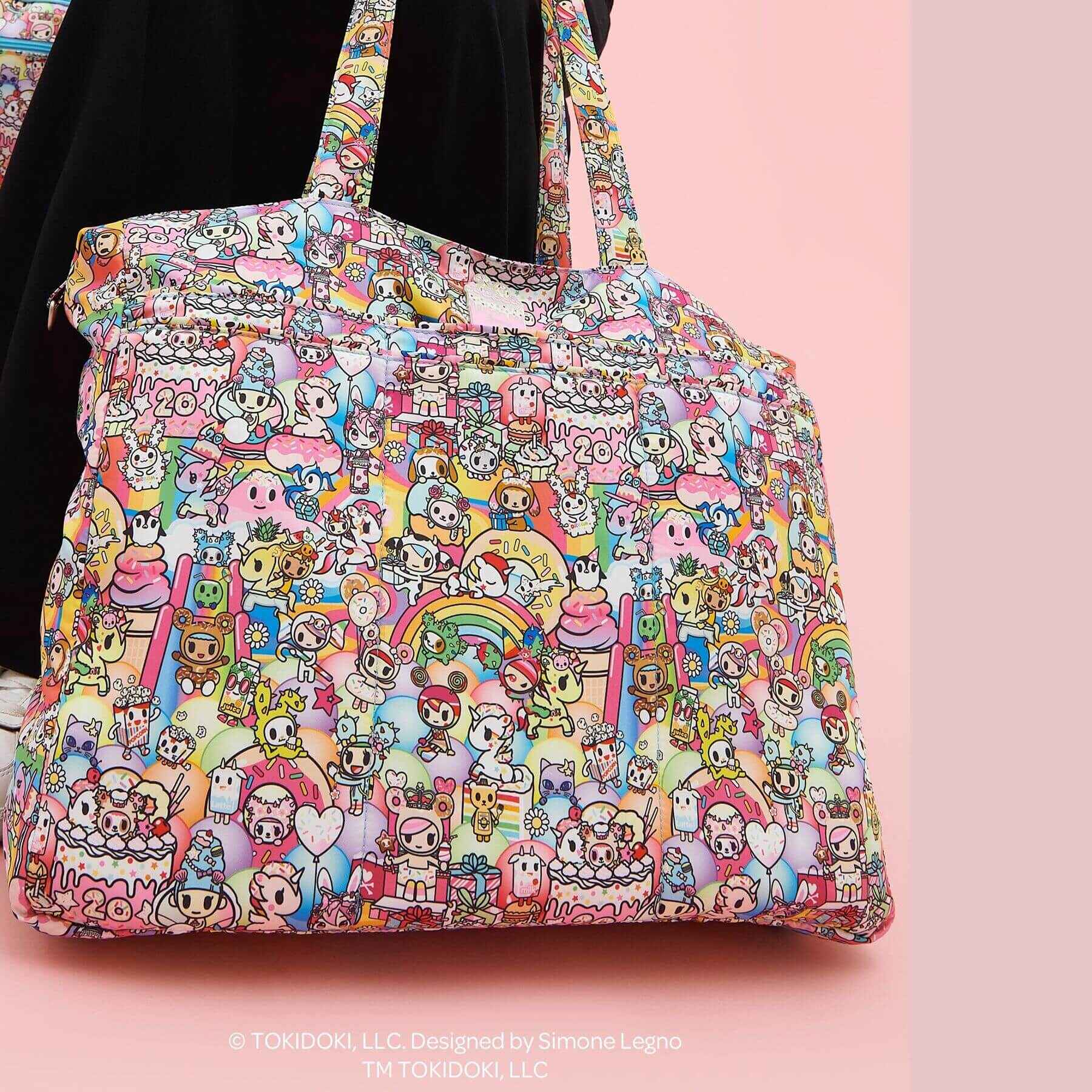 tokidoki Super Be Diaper Bag Tote on a pink background