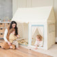 Woman and child playing inside Tiny Land® Sweet Citrus Kid's Play Tent - Creamy white/blue in a room with wooden floor and shelves.