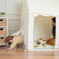 Woman and child playing inside Tiny Land® Sweet Citrus Kid's Play Tent - Creamy white/blue in a room with wooden floor and white walls.