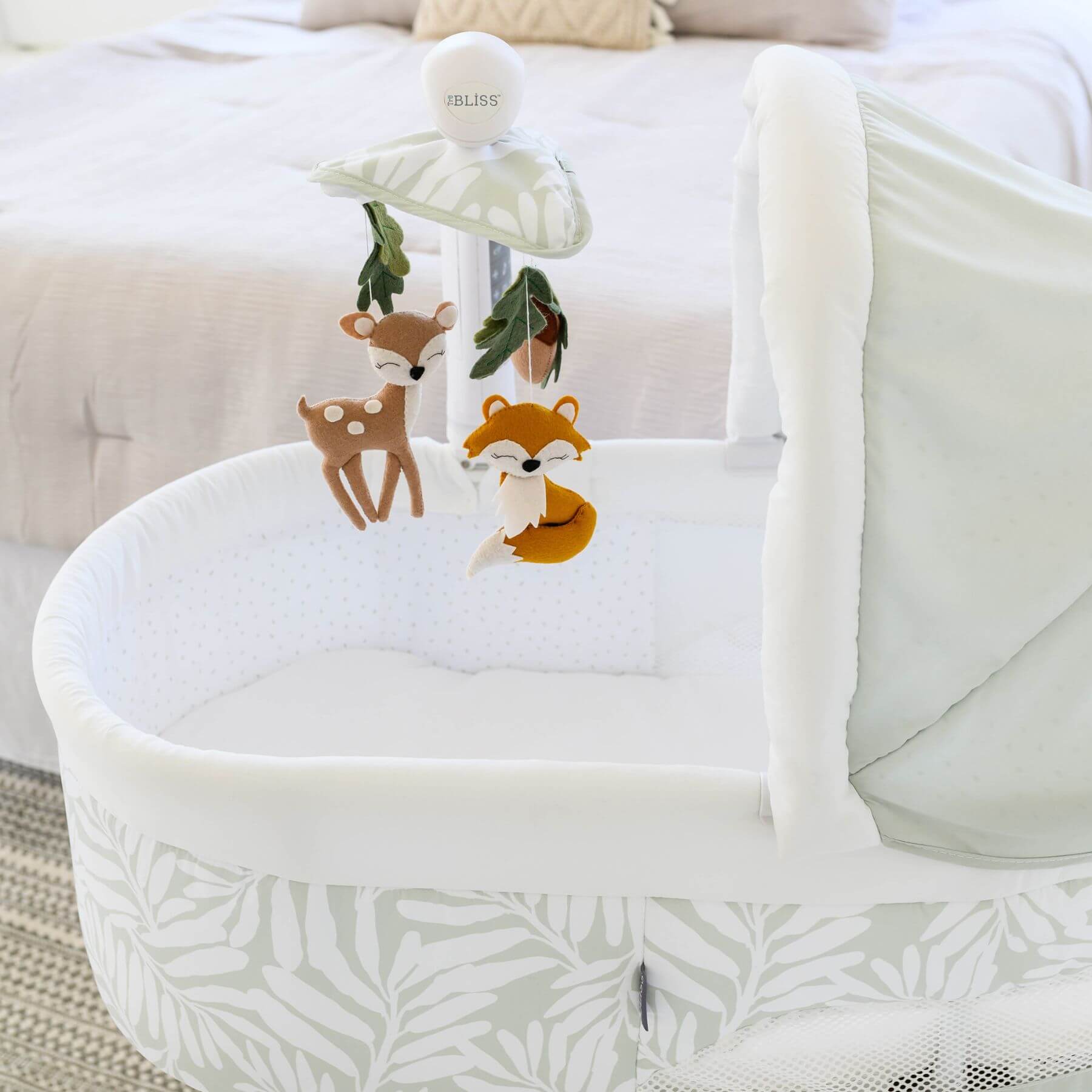 Detail of TruBliss Sweetli Calm Bassinet Sage Fern Leaves