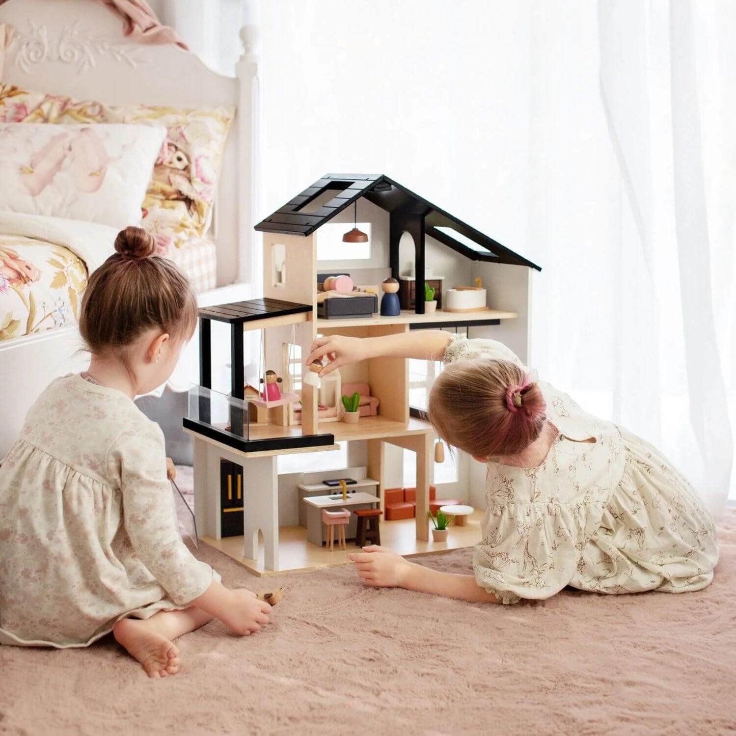 Girls Playing Tiny Land® Sweetwood Edge Dollhouse