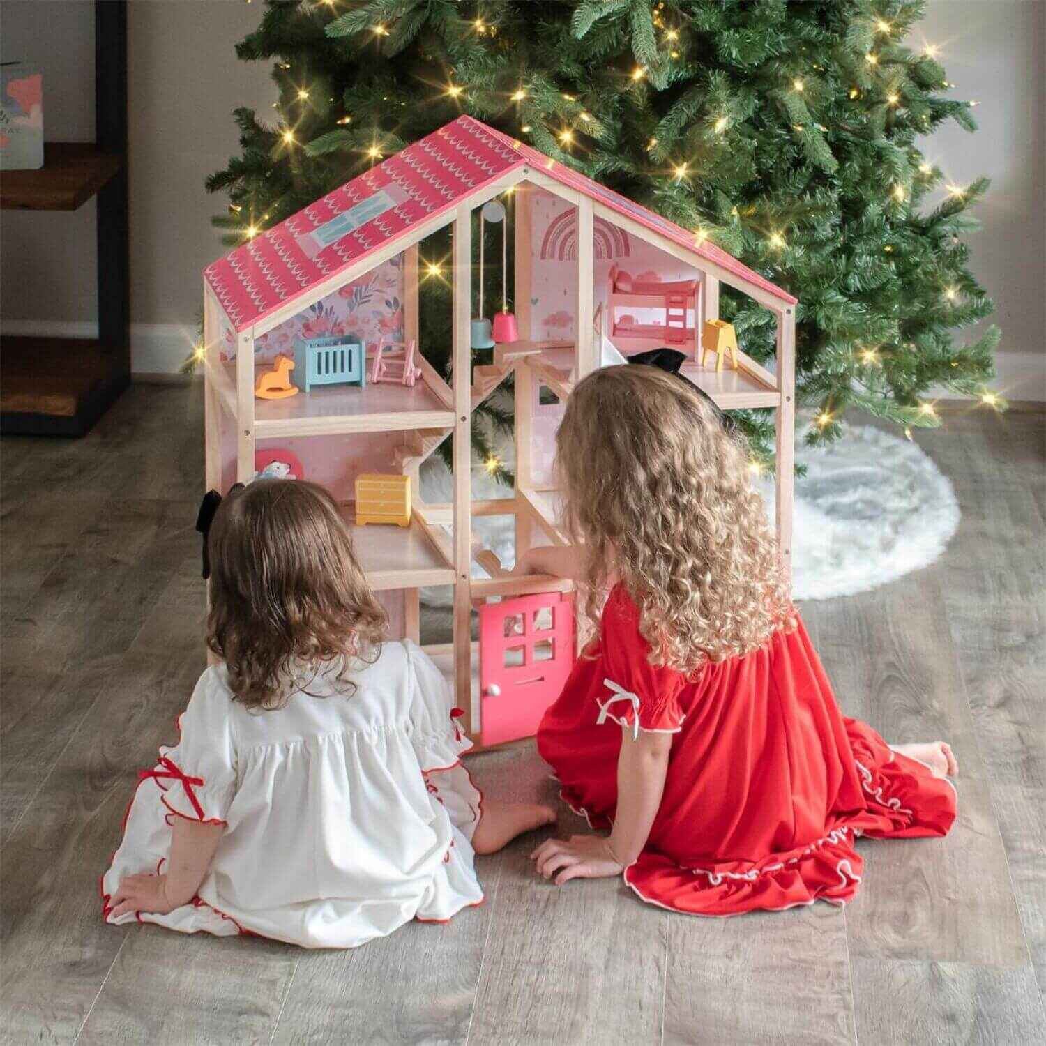 Girls Playing Tiny Land® Sweetwood Love Dollhouse