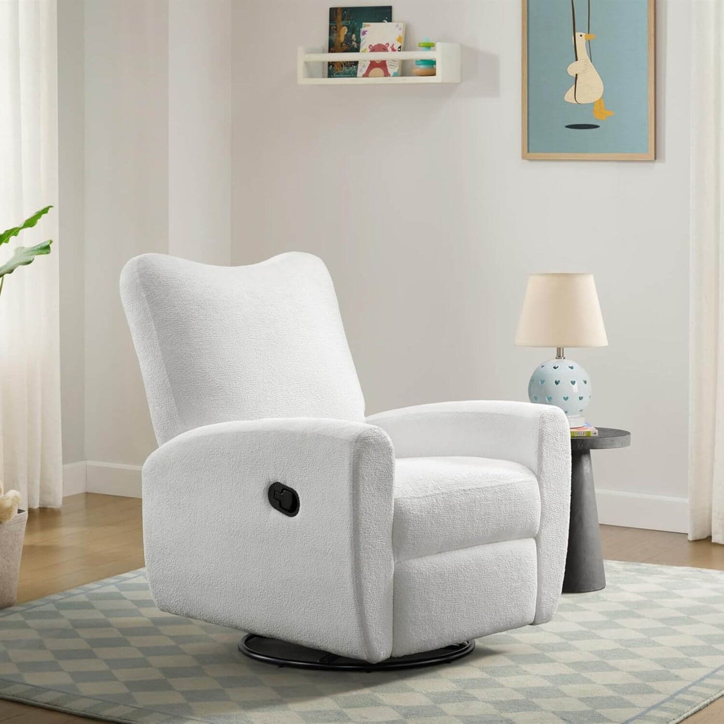 Oxford Baby Synergy Glider - Plush White in a living room setting with a lamp and decor items.